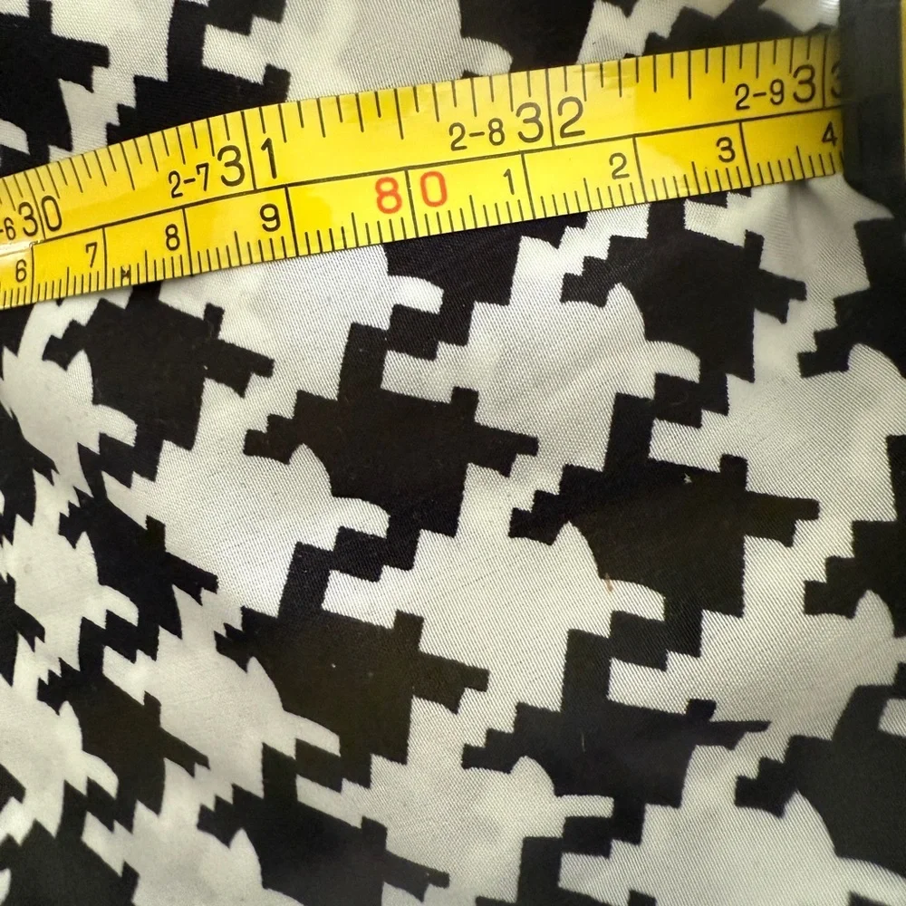 Infinity scarf, black & white, 100% polyester.